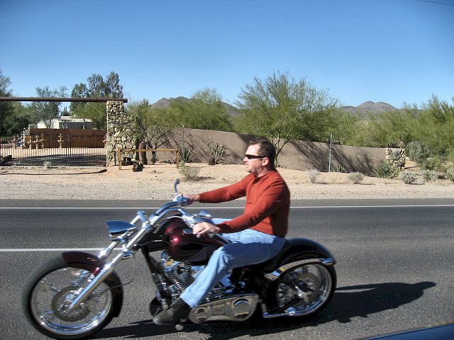 Larry Riding By