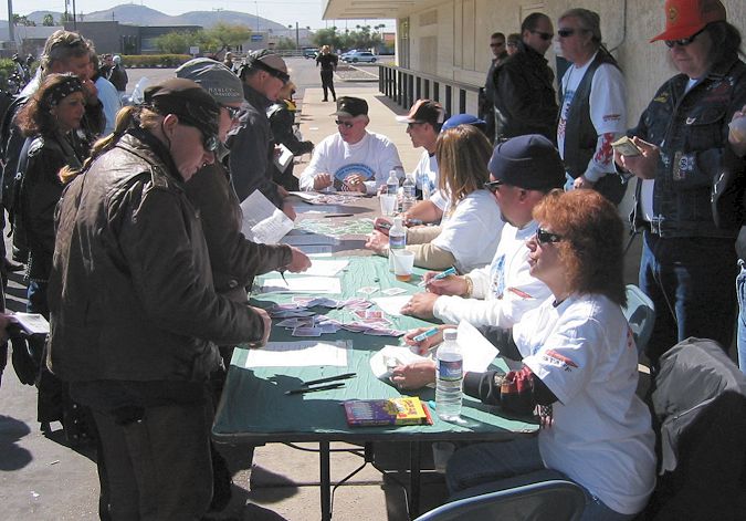 Volunteers giving cards