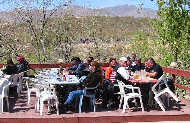 Riders eating lunch on deck