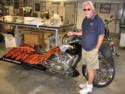 Arlen Next To The Bike That He Rides To Sturgis With Hamsters
