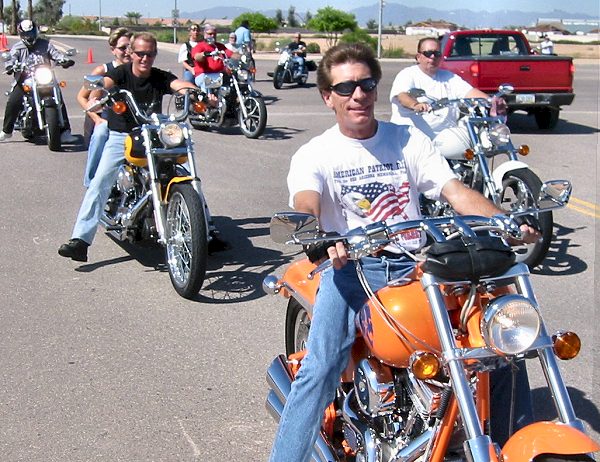 Riders Entering The Park