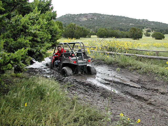 Tyler Tests out the RZR in the mud. 
