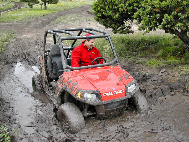 Tyler Tests out the RZR in the mud. 