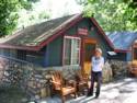 Mrs. C. in front of our Anthony and Cleopatra Cottage