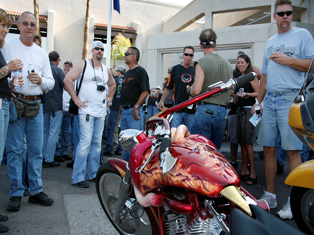 Riders Check Out the Heart Bike