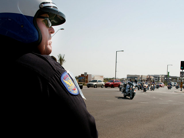 Phoenix Police Watches the Line of Bikes